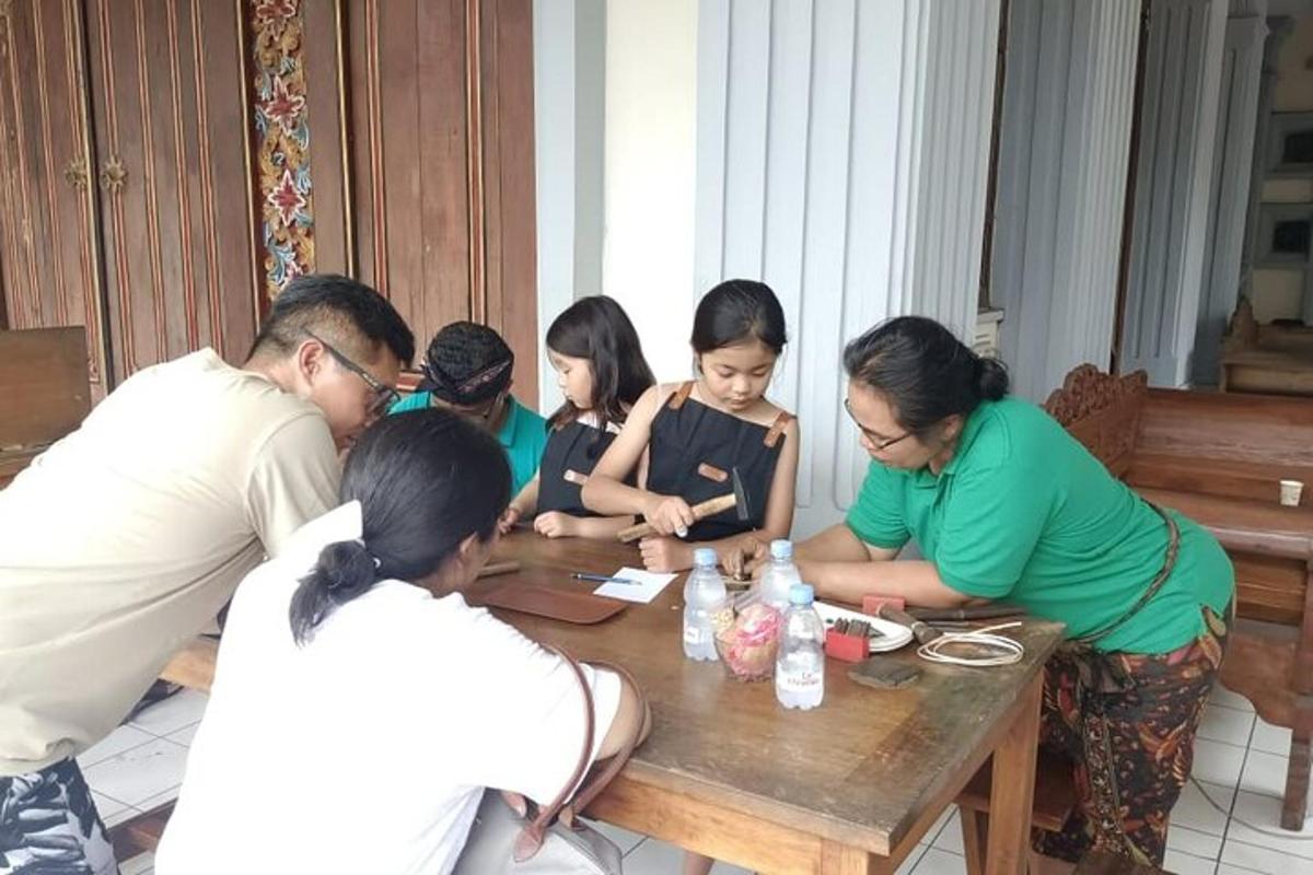 a group of people sitting around a wooden table