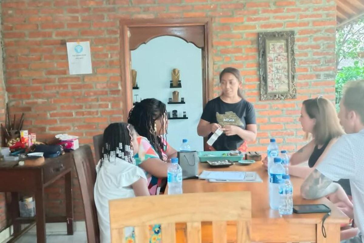 a group of people sitting around a table