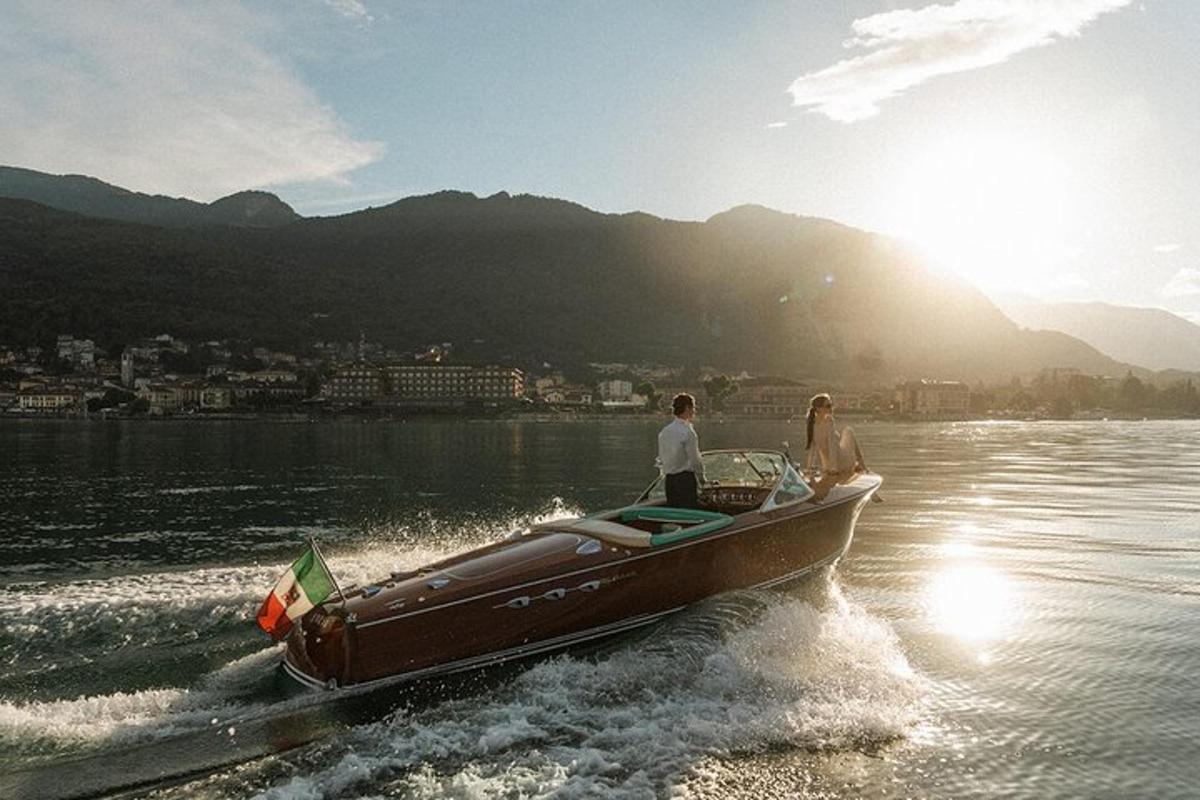 a man and a woman on a boat in the water