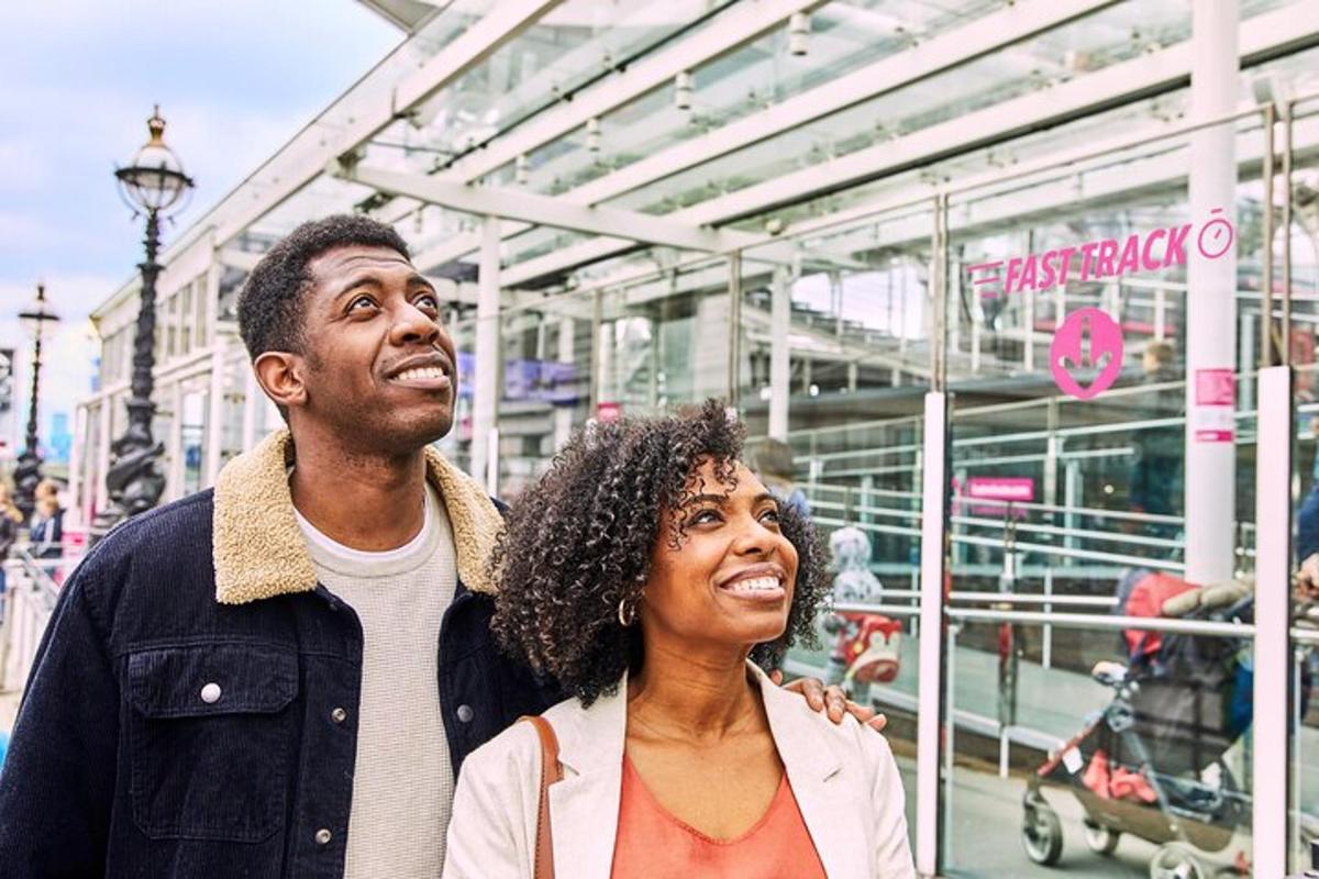 a man and a woman standing in front of a store