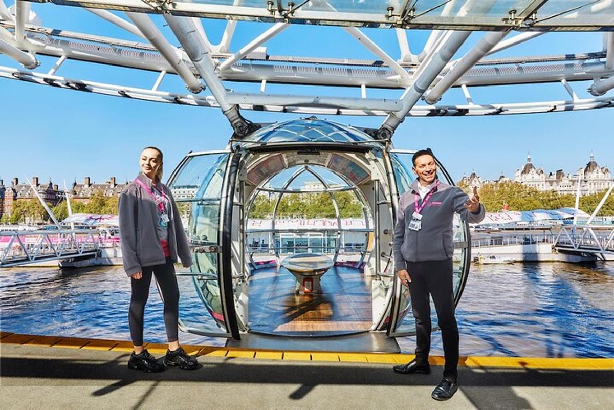 two men standing in front of a boat on the water