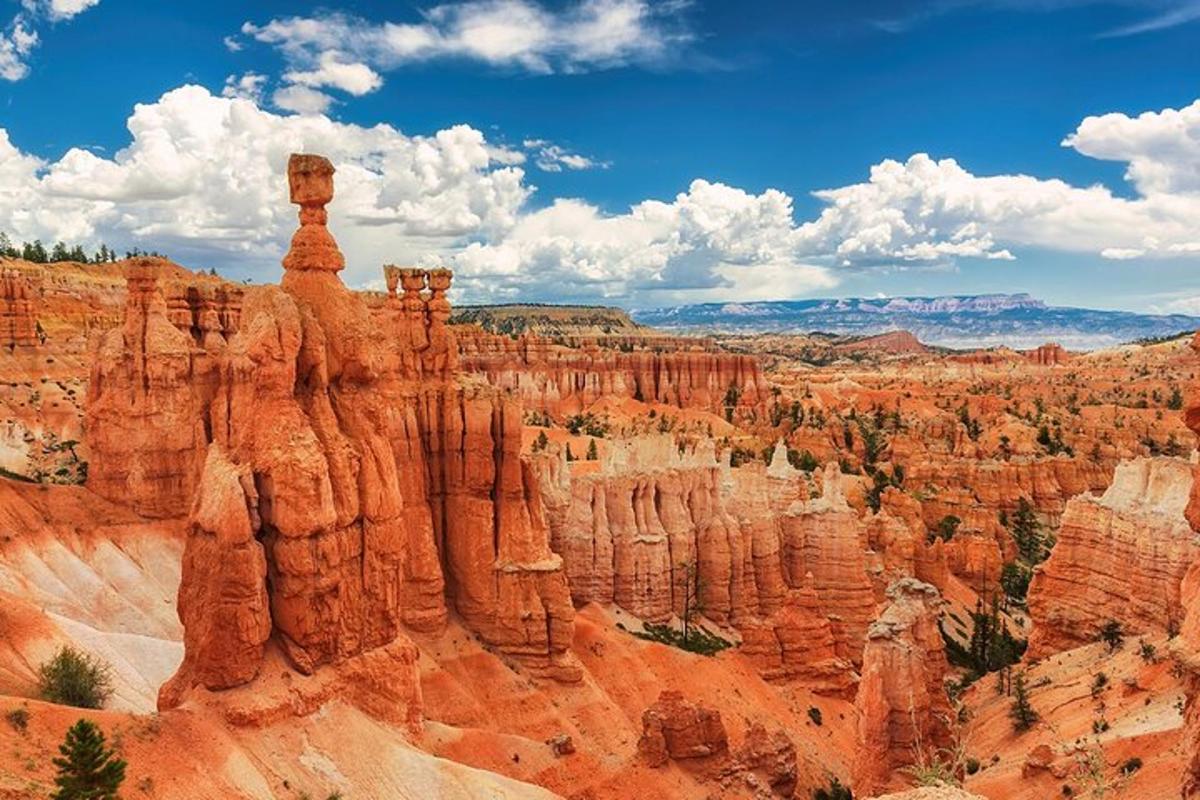 a view of a canyon with a tall rock formation