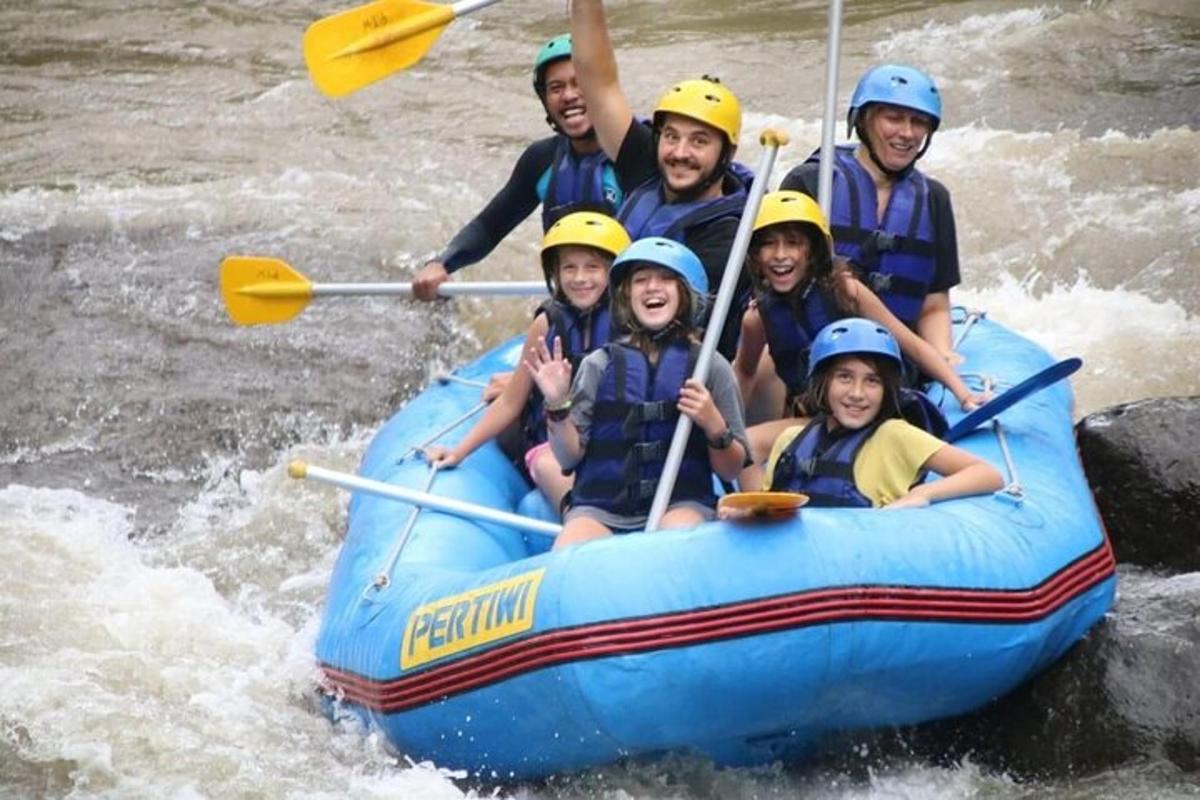 a group of people on a raft in the river