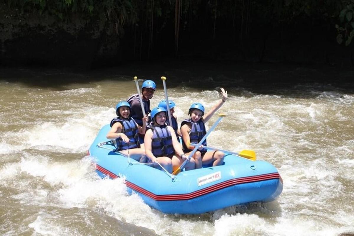 a group of people in a raft on a river