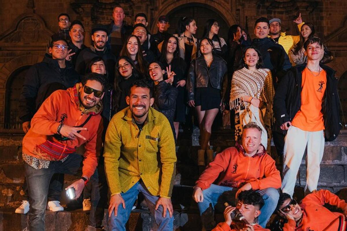a group of people posing for a picture on a stage