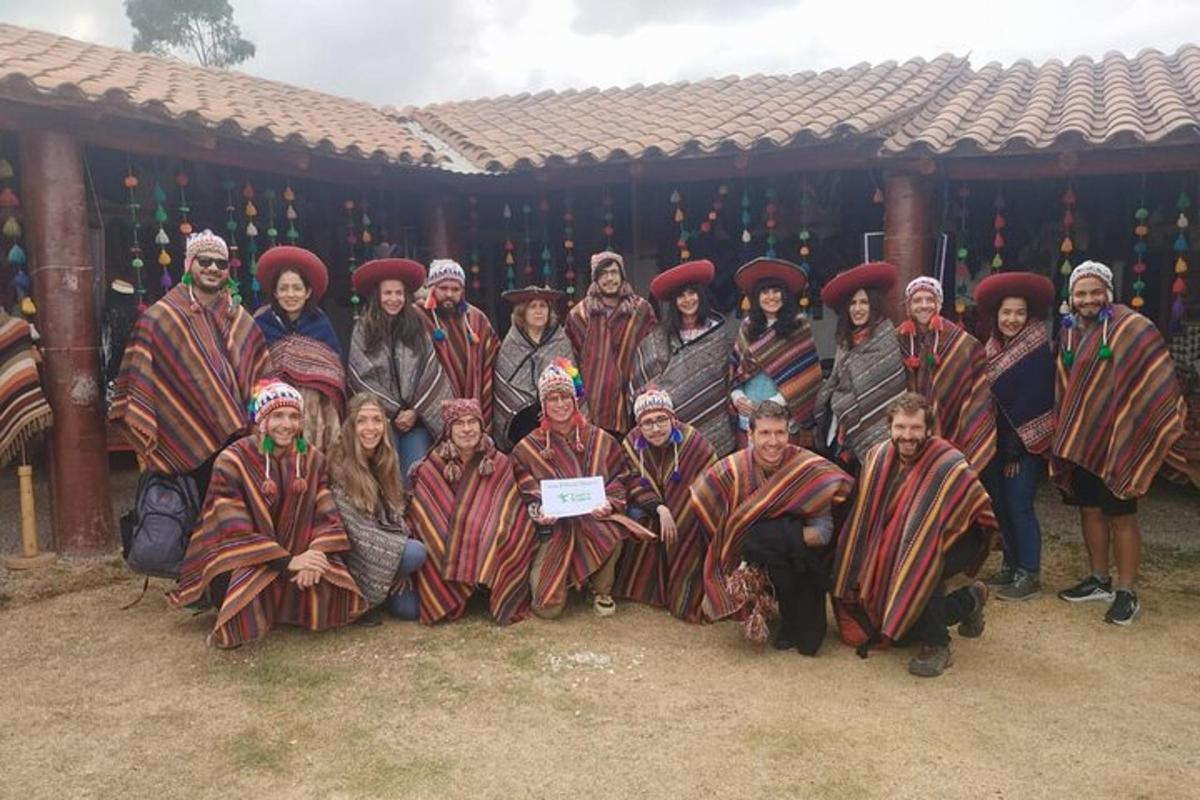 a group of people dressed in costumes posing for a picture