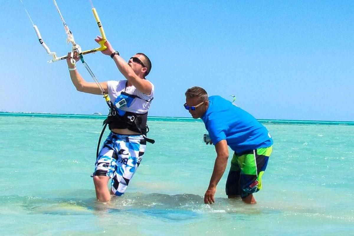 two men standing in the water in the ocean