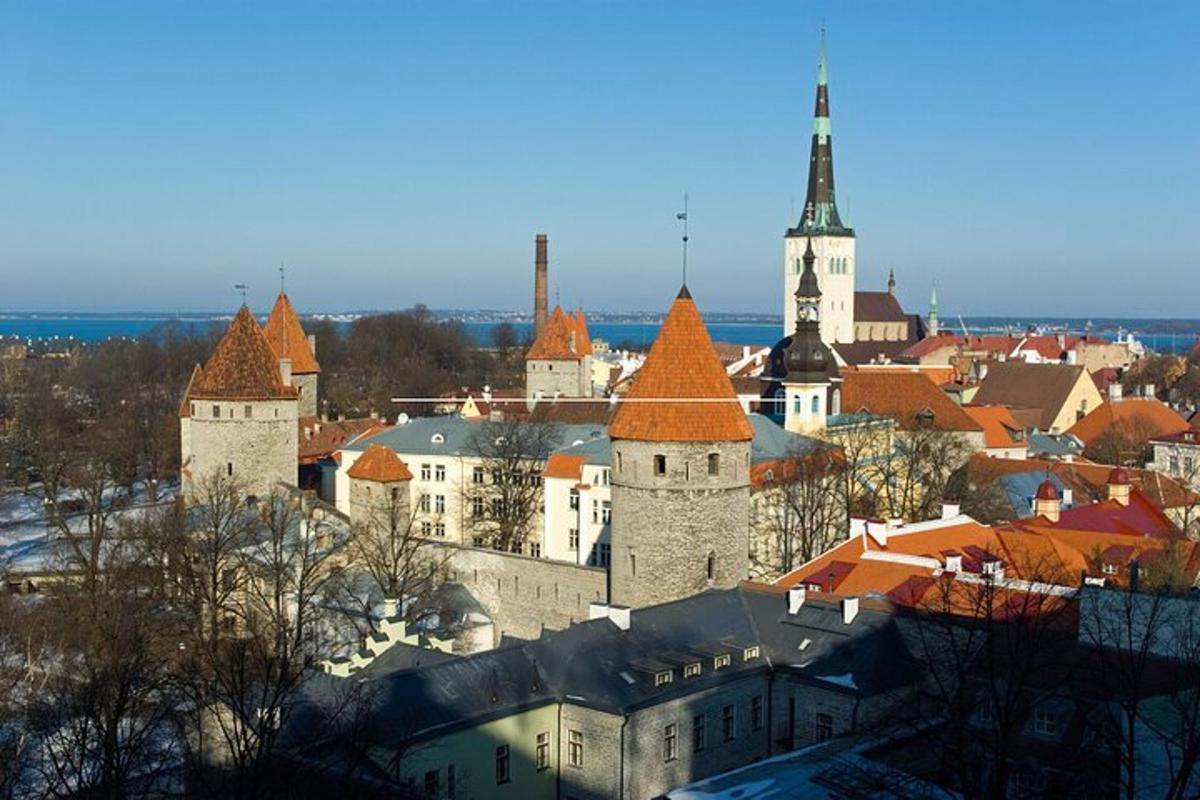 a view of a city with buildings and a clock tower