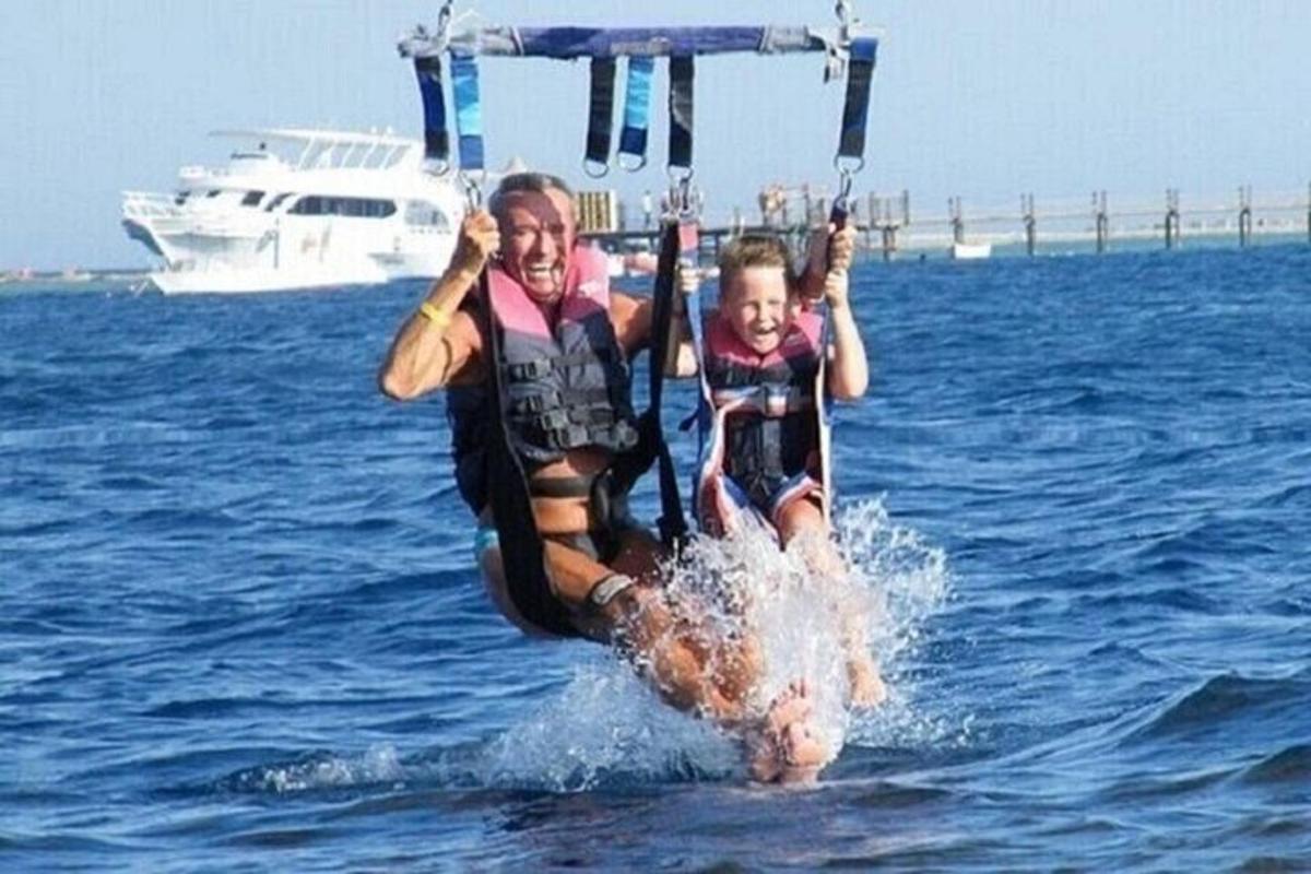 two people on a boat in the water