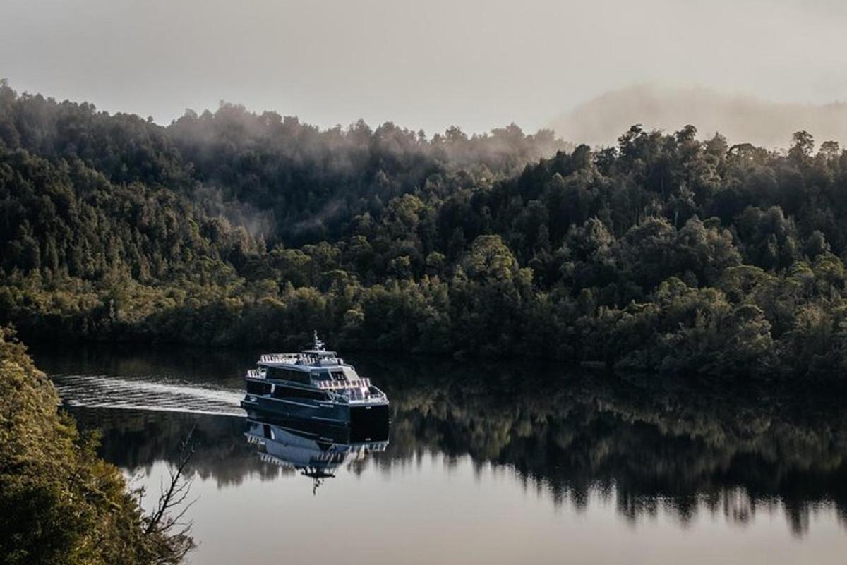 a large boat in the middle of a river