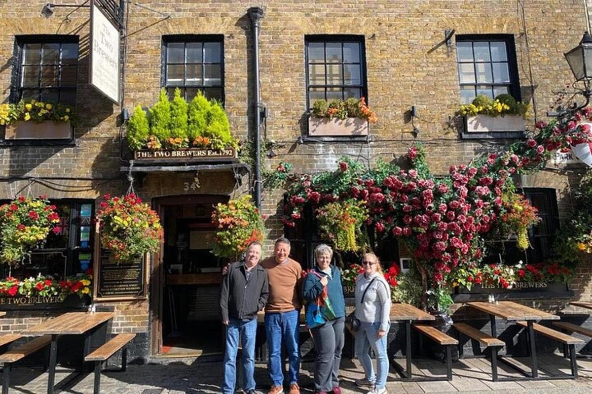 a group of people standing in front of a building