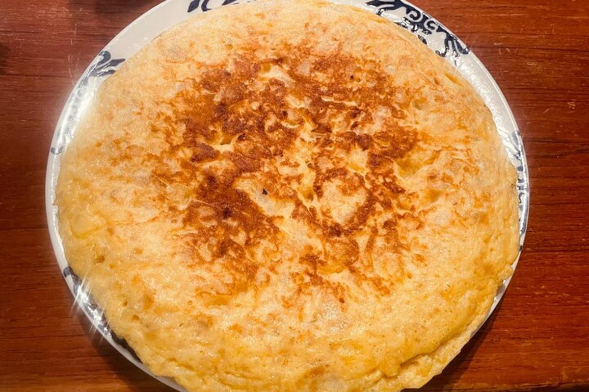 a pie sitting on a plate on a wooden table