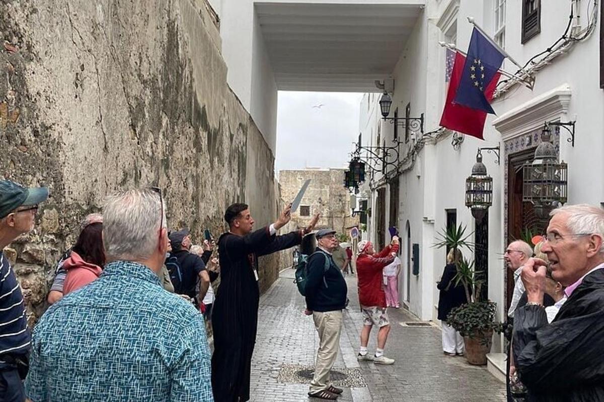 a man standing in an alley with a flag