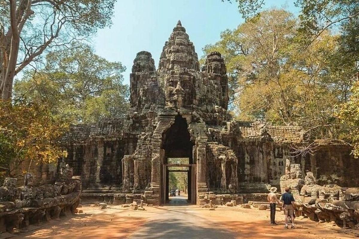 a group of people standing in front of a temple
