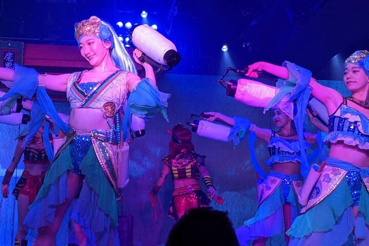 a group of performers on the stage at a performance