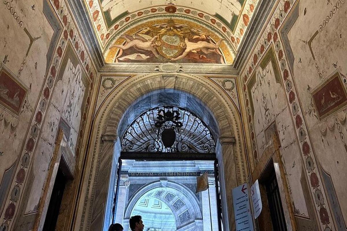a person walking through a hallway with a ceiling