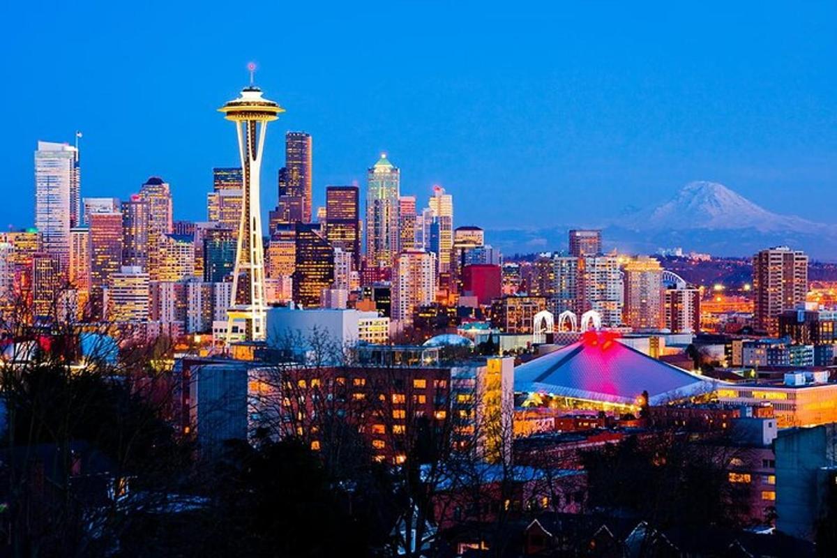 a view of a city with the seattle needle