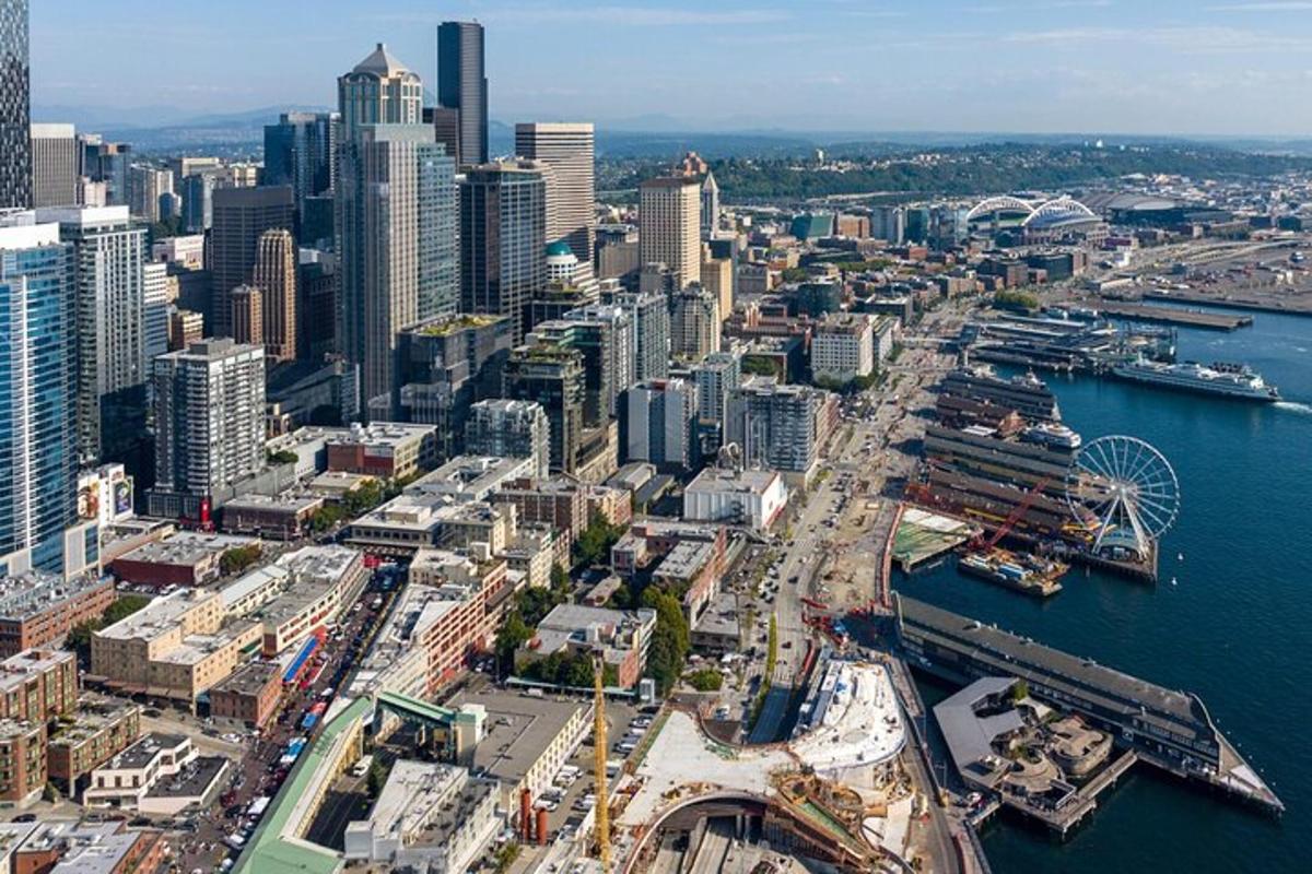 an aerial view of a city with a harbor