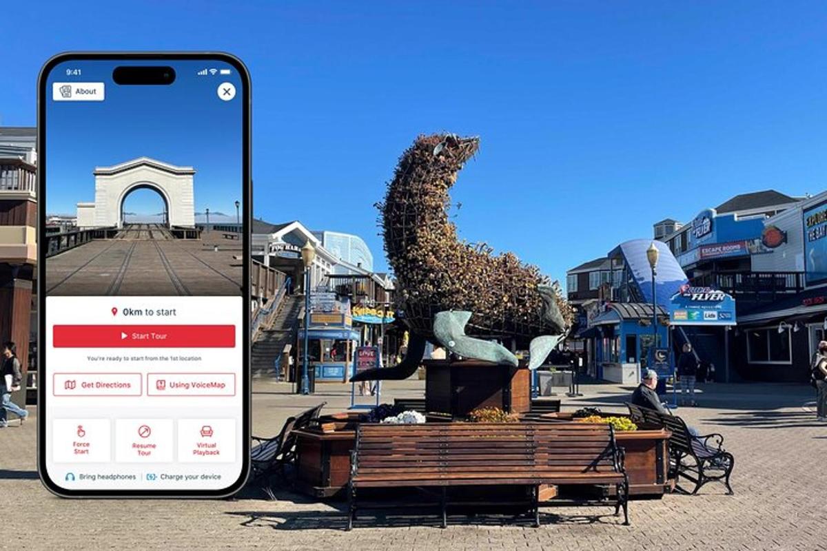 telefon robiący zdjęcie posągu dinozaura