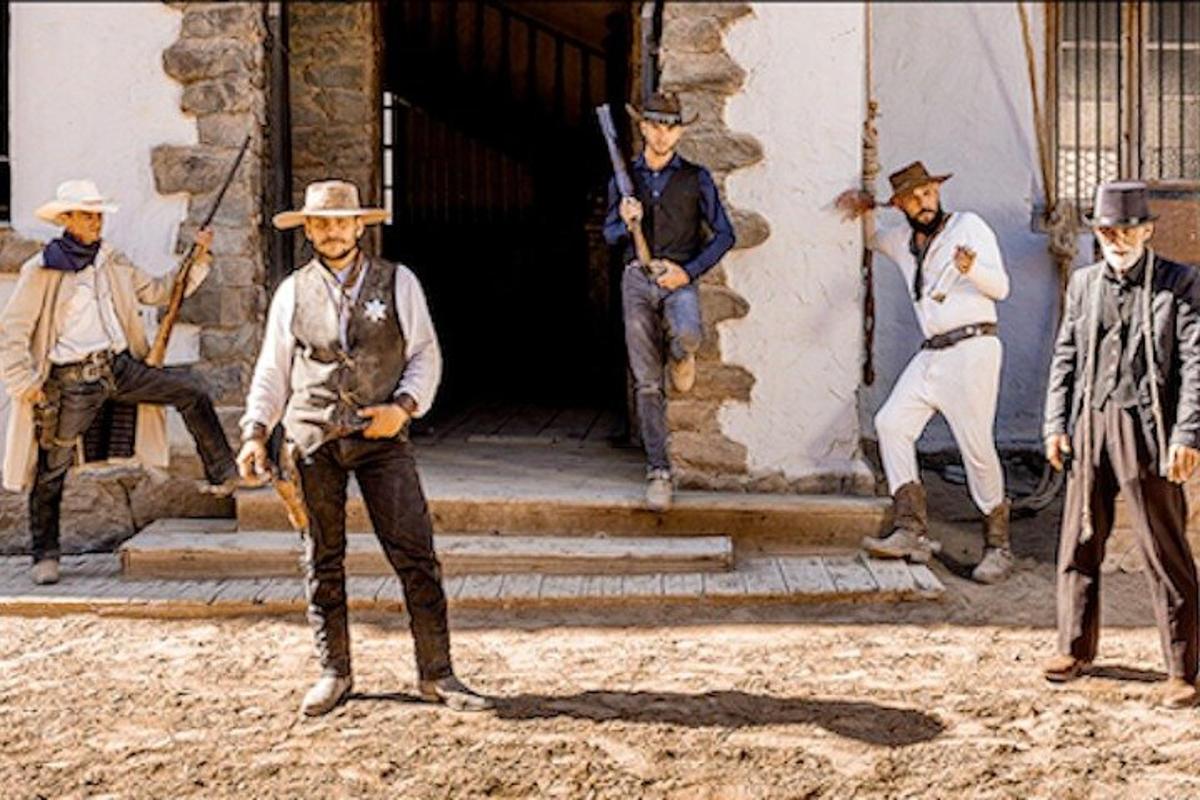 a group of men standing in front of a building
