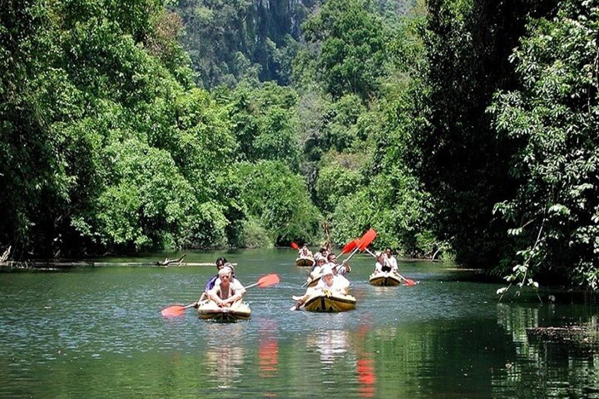 a group of people on kayaks on a river