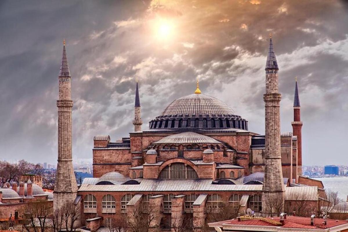 a large building with two mosques with tall towers