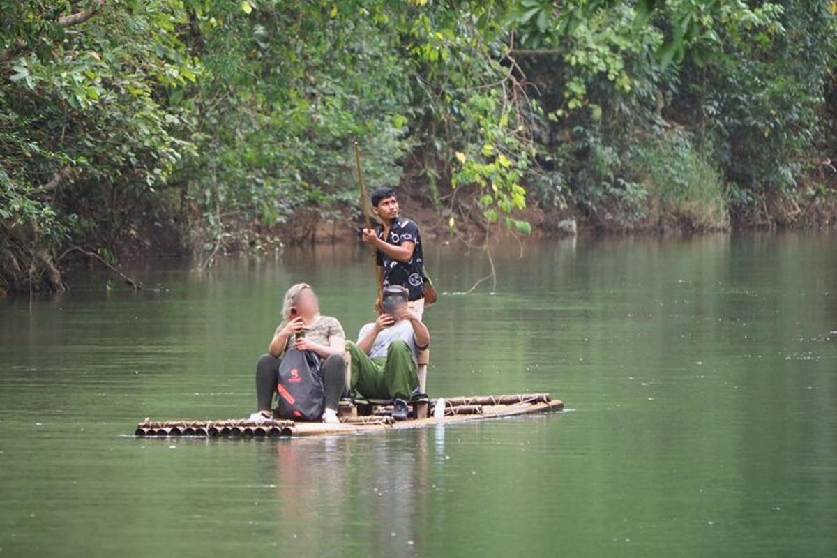 a group of people on a raft in the water