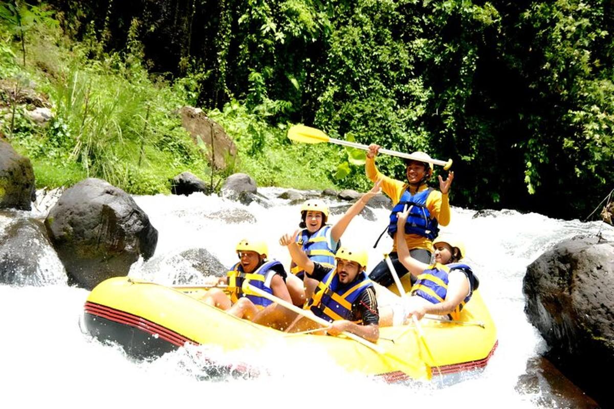 a group of people on a raft in a river