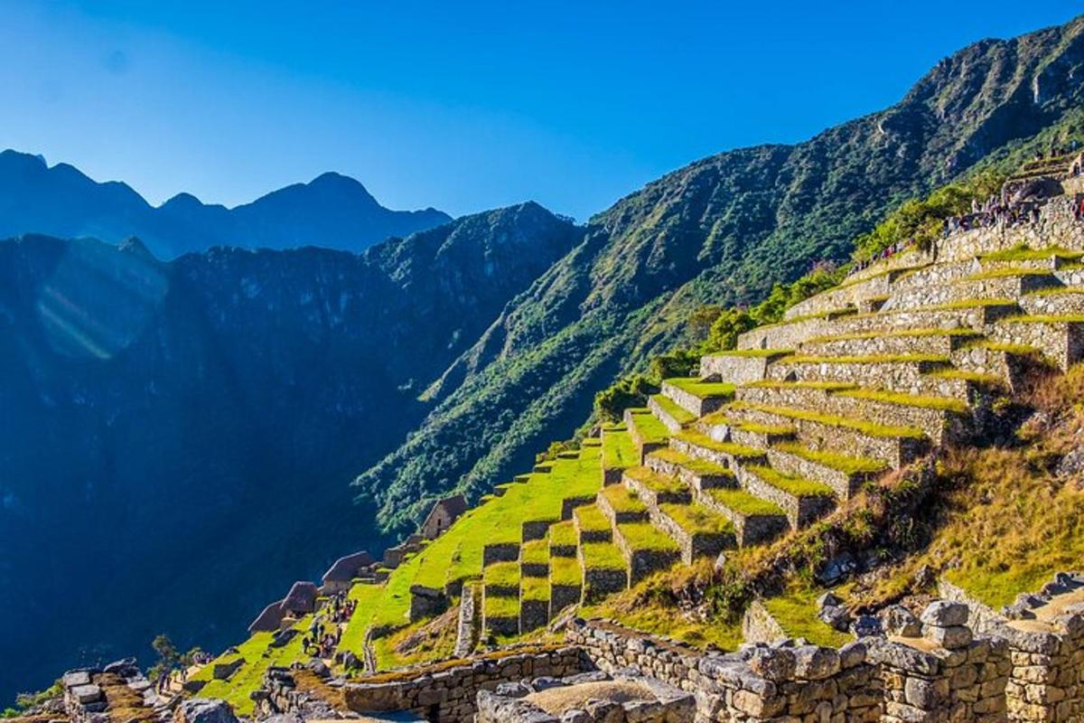 an ancient amphitheater on the side of a mountain