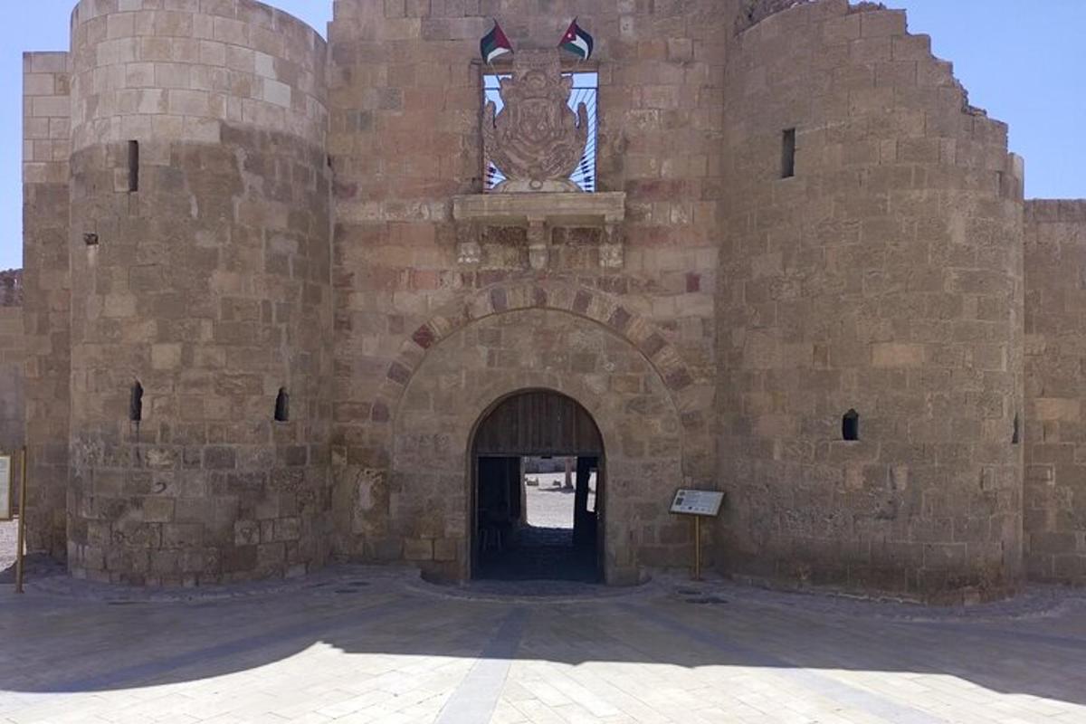 a large stone building with a large doorway