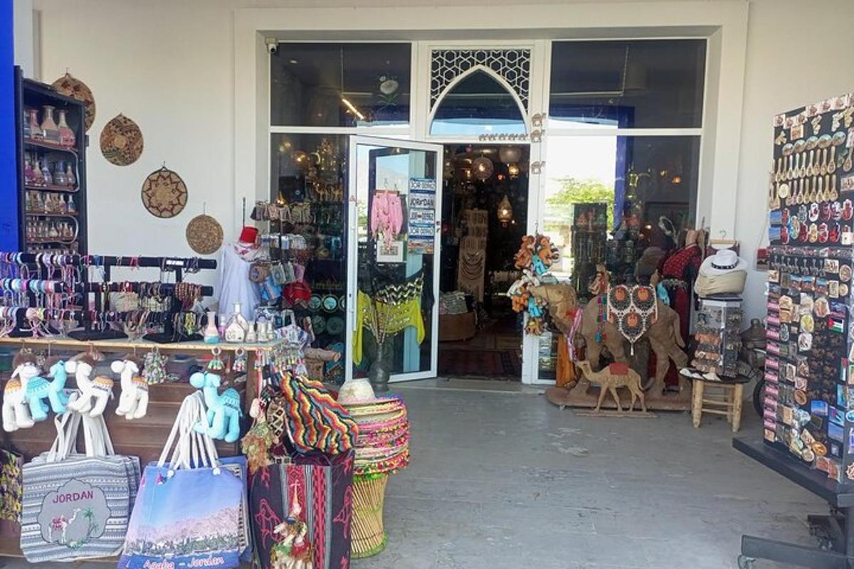 a store front of a store with a horse and merchandise