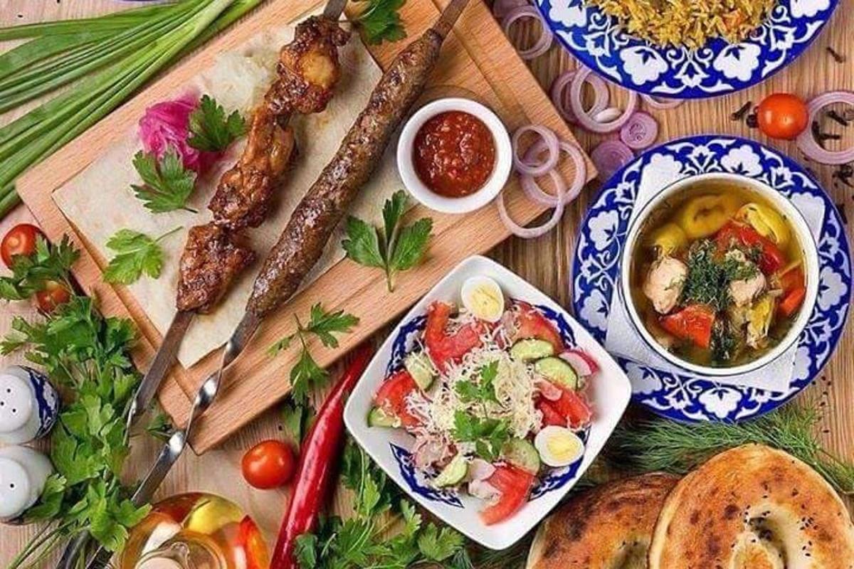 a table topped with different types of food on plates
