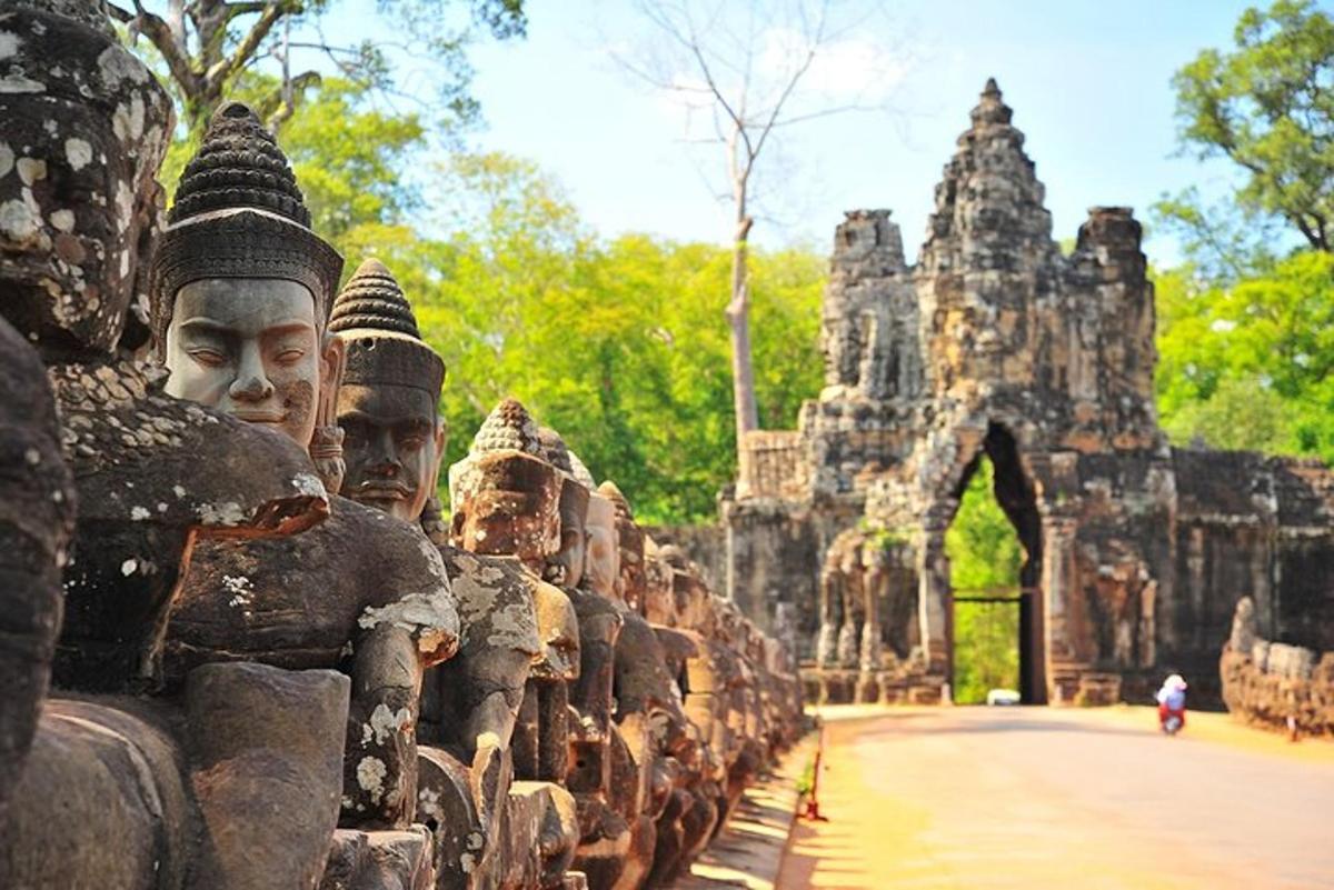 a group of stone statues in front of a building