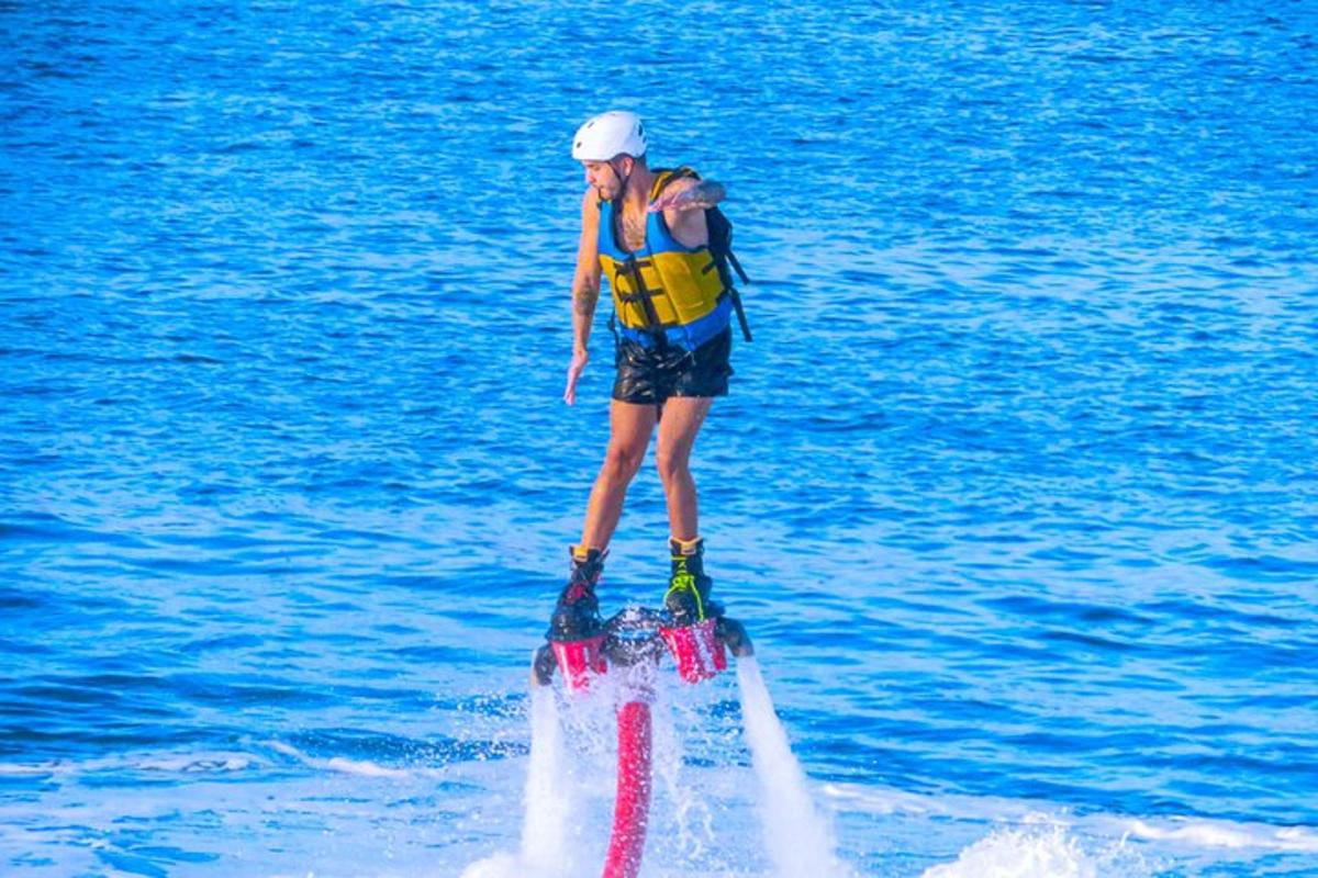 a woman is standing on top of the water