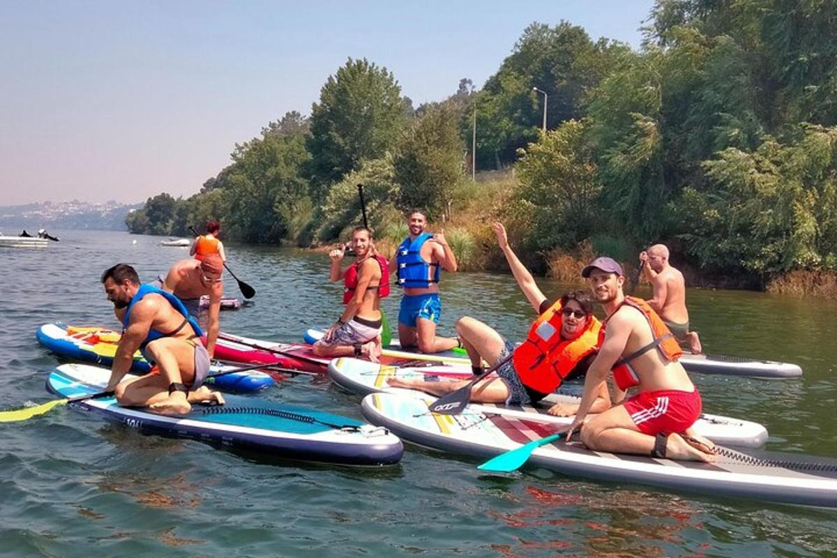 a group of people on paddle boards in the water