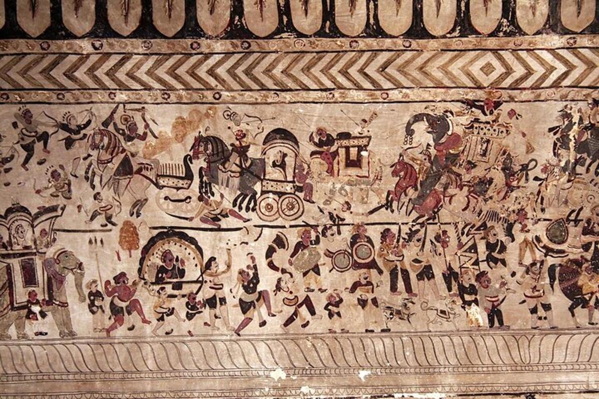 a wall with a painting of people on it