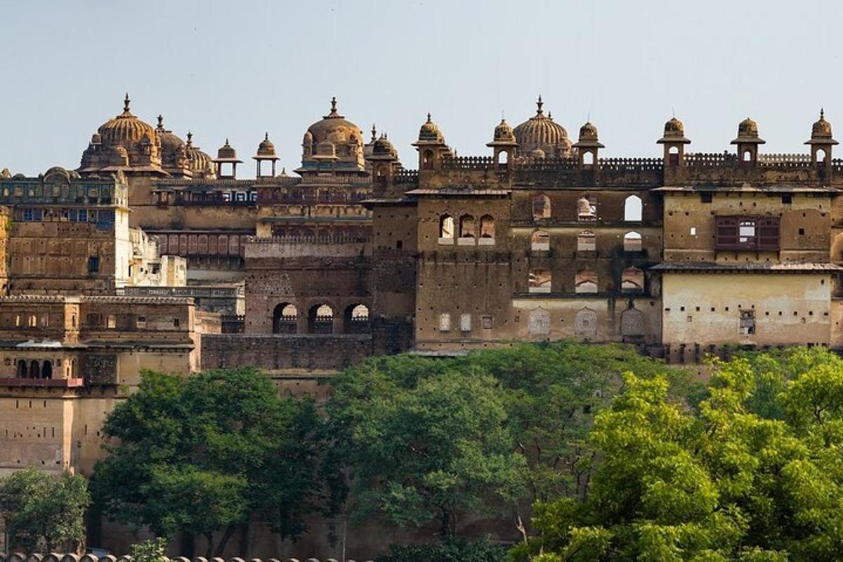 a large building sitting on top of a hill