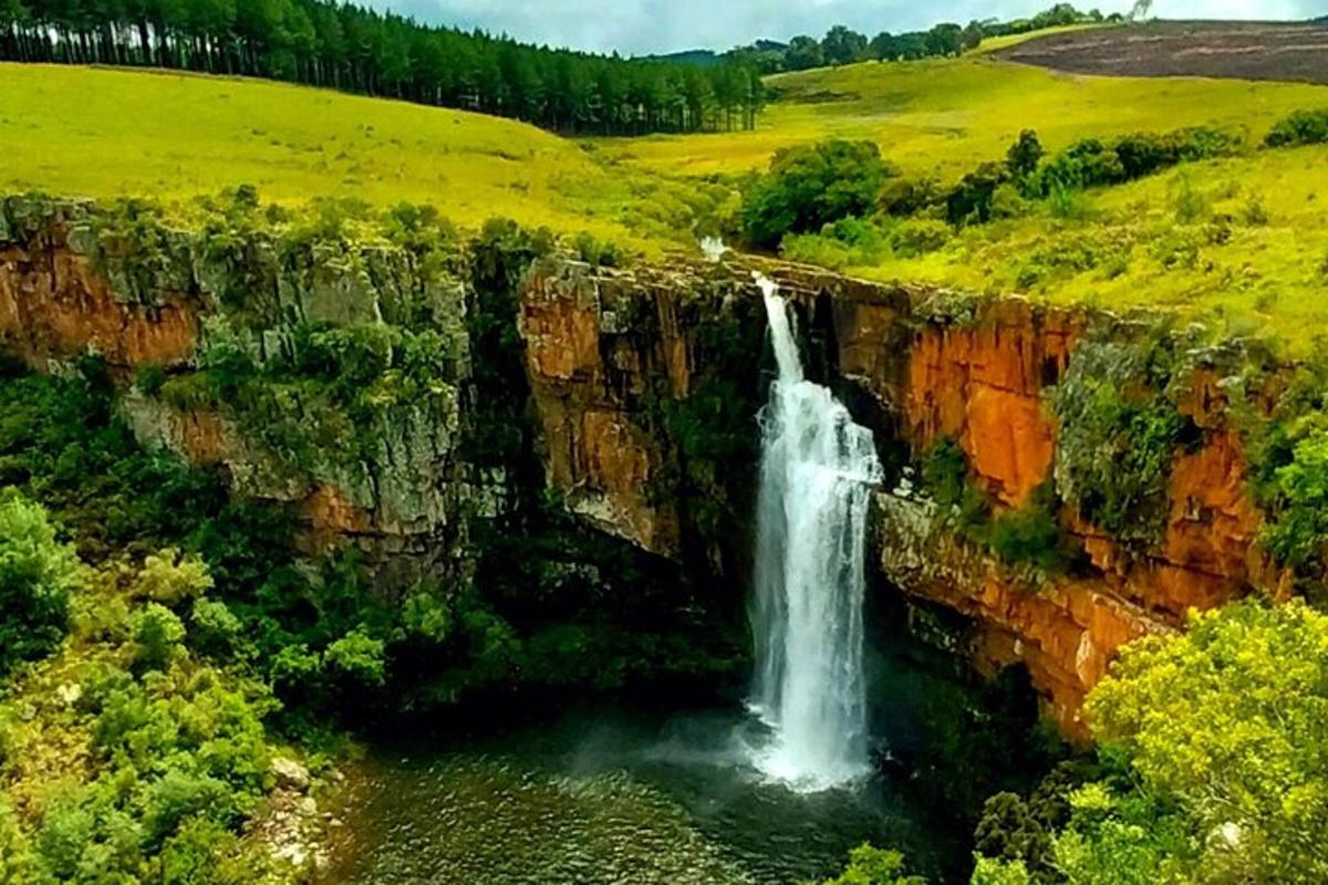a waterfall on the side of a cliff