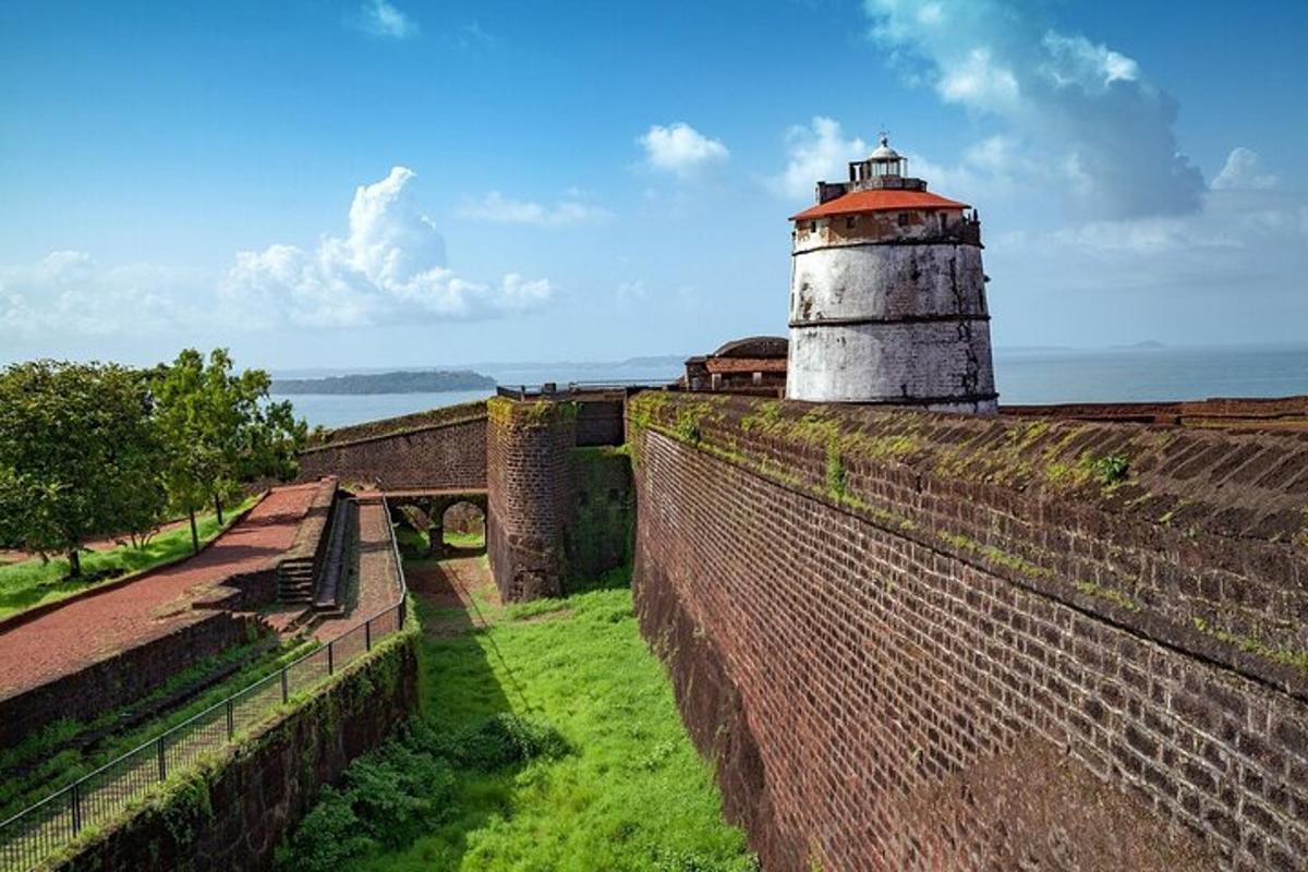a lighthouse sitting on top of a brick wall