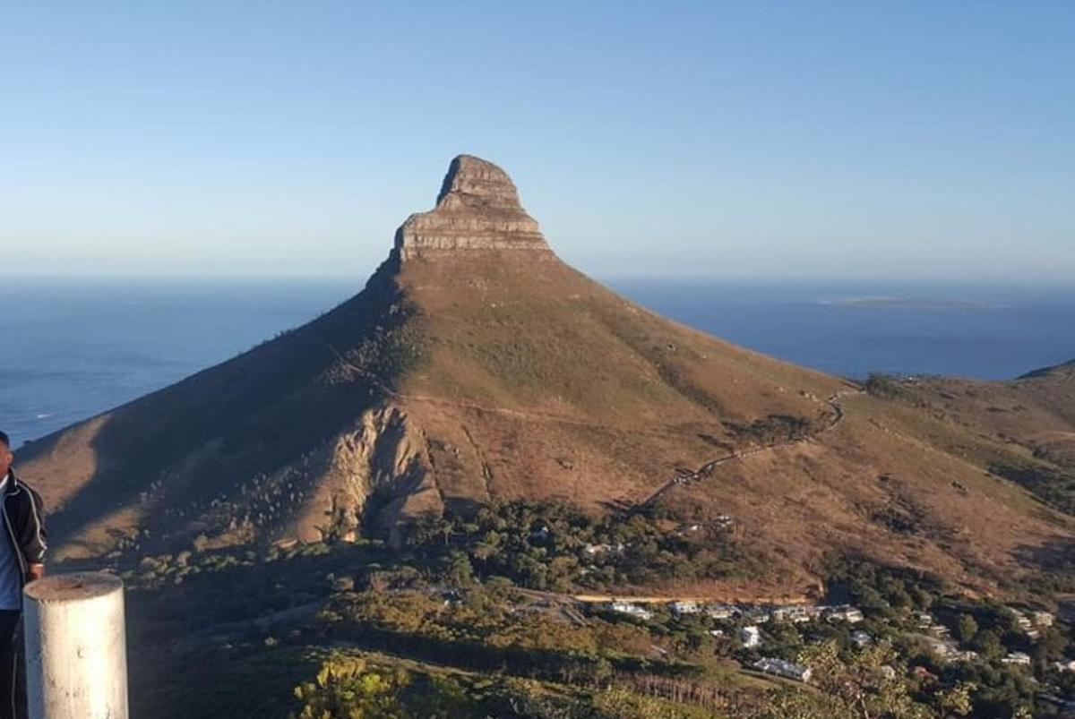 a man standing on top of a mountain