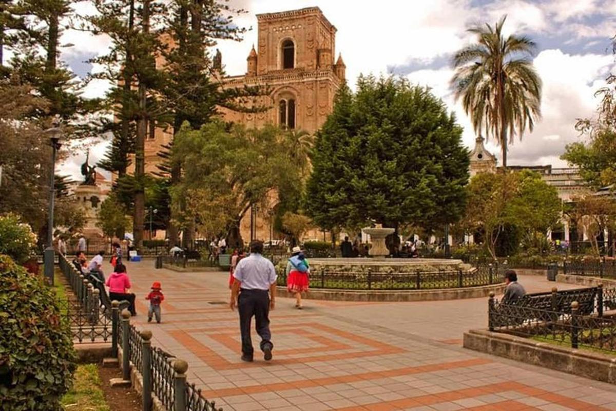 a group of people walking in front of a church
