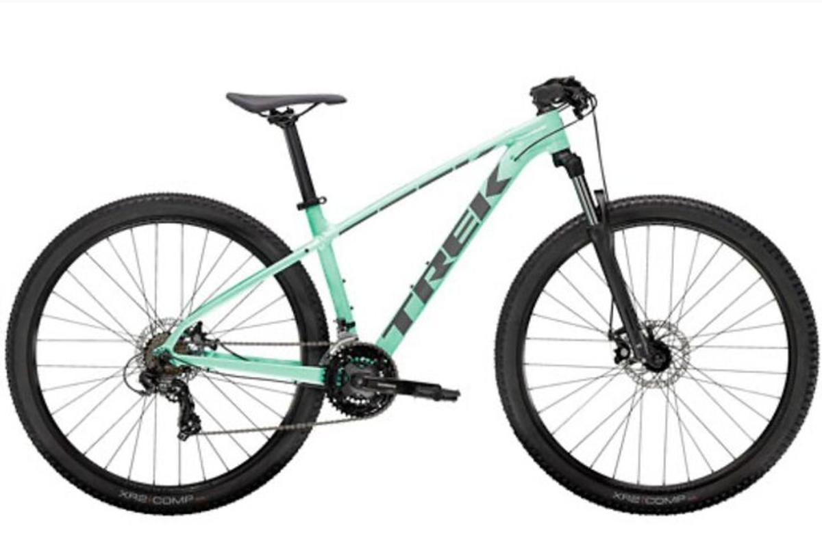 a blue bike is flying in the air