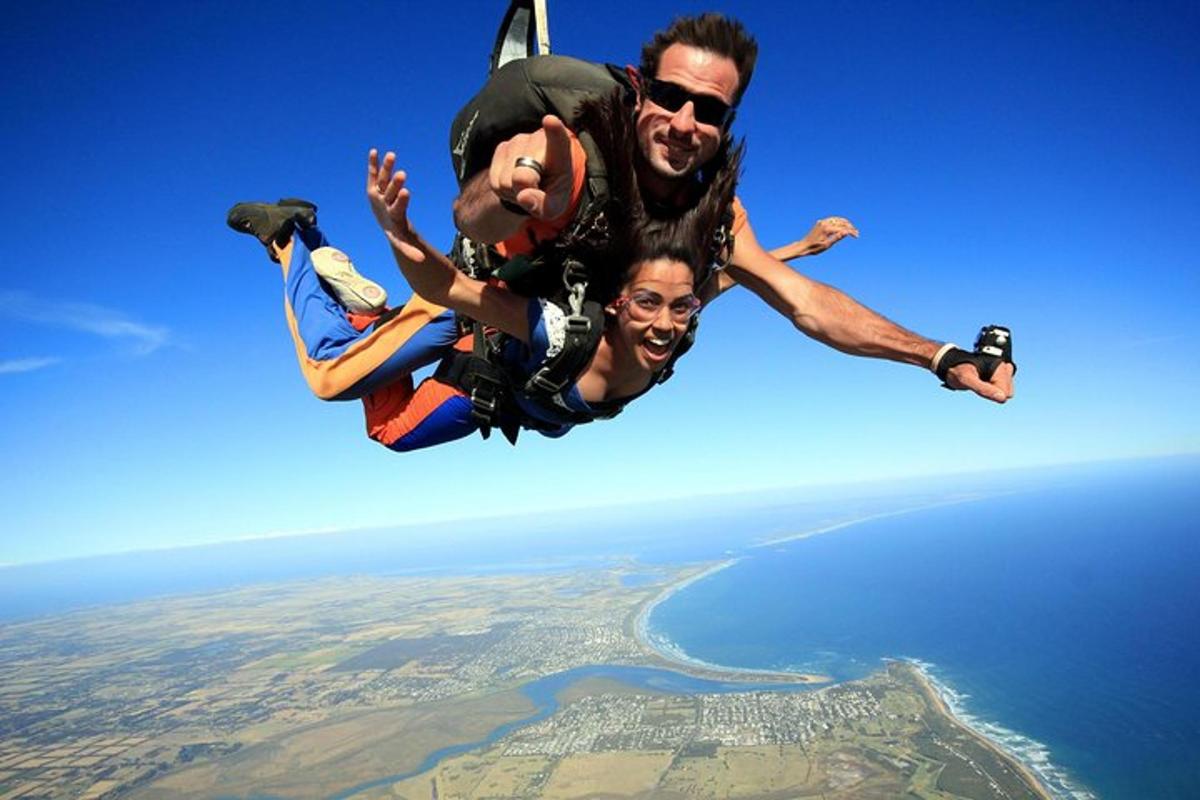 two men are flying in the air in the sky