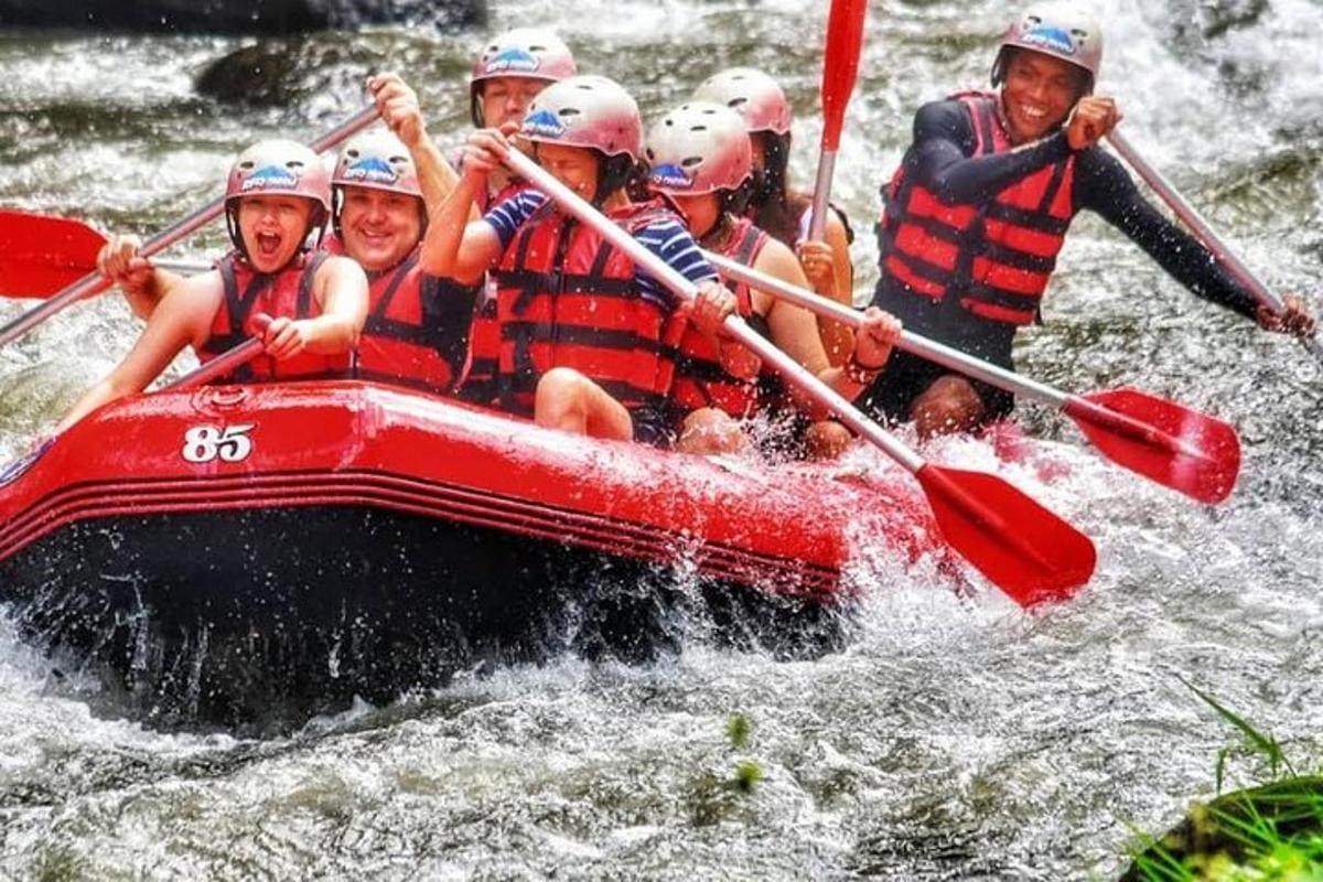 a group of people in a raft on a river