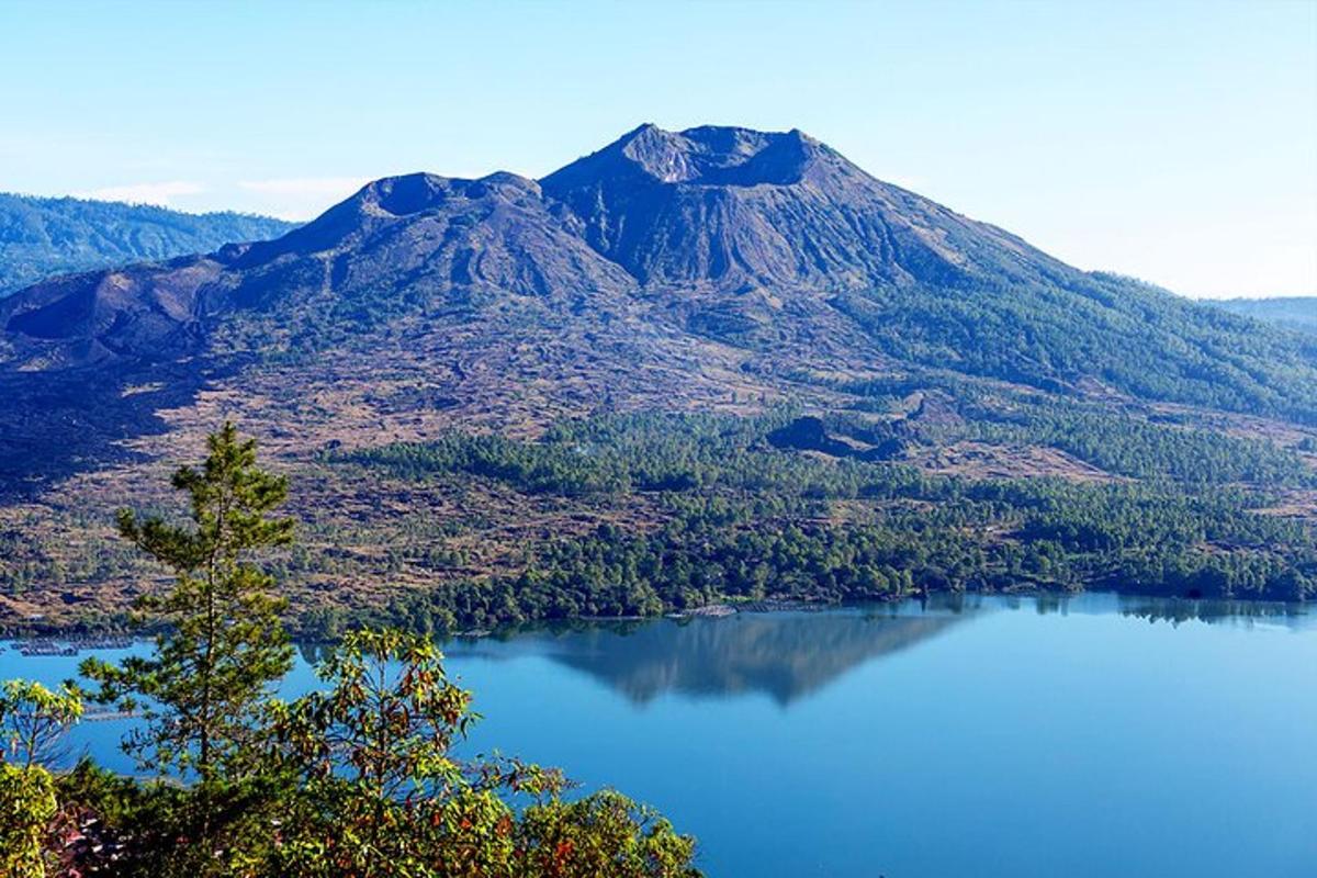 a mountain with a blue lake in front of it
