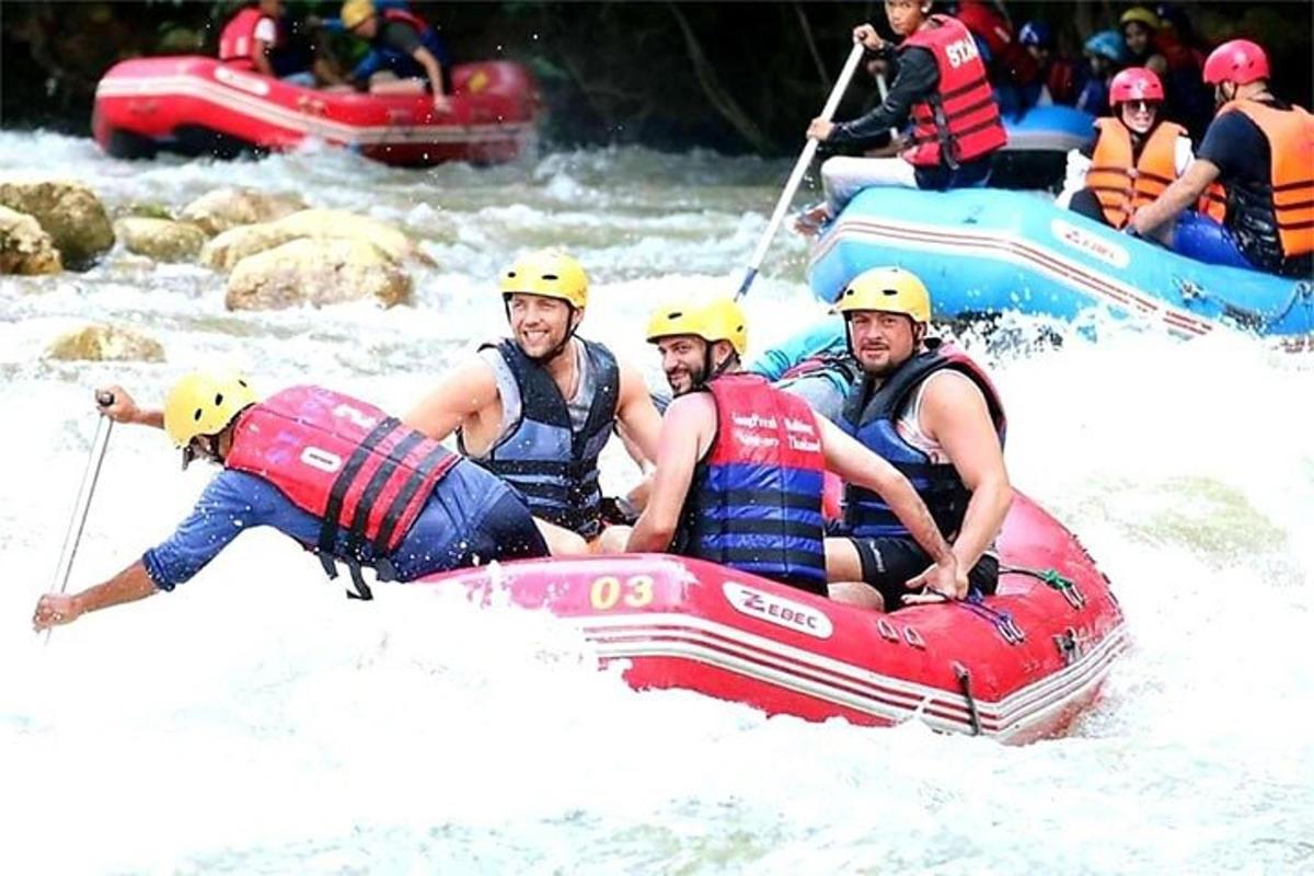a group of people rafting on a river