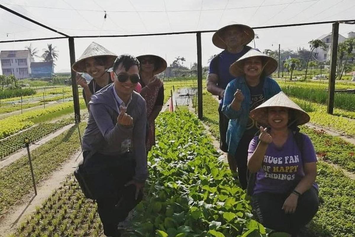 a group of people wearing hats in a garden