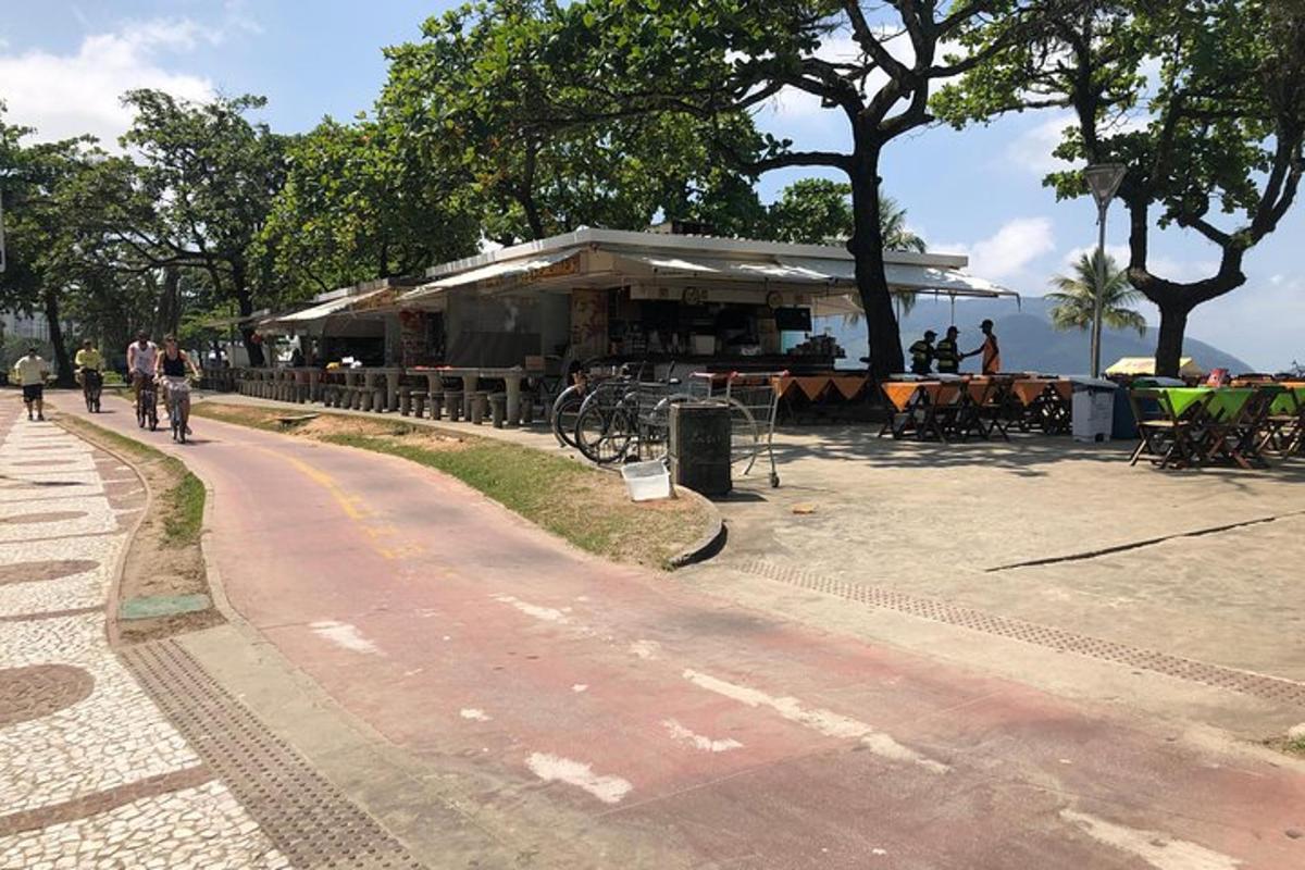 a building on a street next to the water
