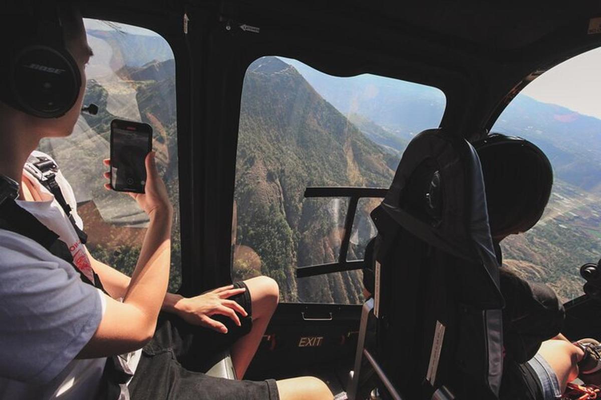 a group of people sitting in a helicopter