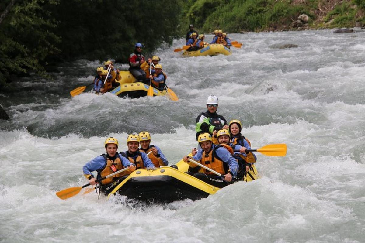 a group of people in a raft on a river